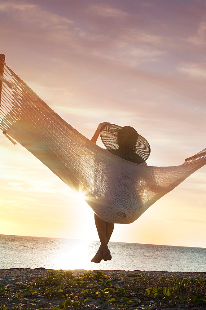 Woman on a hammock on the beach, Florida, United States of America, North America