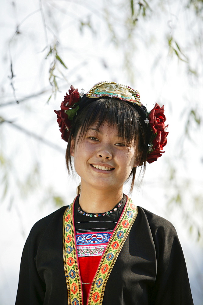 Young woman of Yao Minority mountain tribe, with traditional costume, Li River, Yangshuo, Guangxi Province, China, Asia