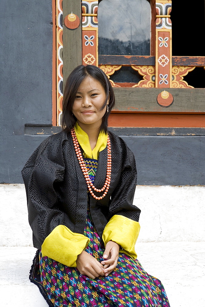 Bhutanese woman in typical dress at Buddhist festival (Tsechu), Trashi Chhoe Dzong, Thimphu, Bhutan, Asia