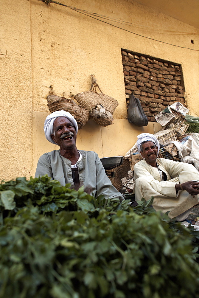 Traders laughing in Luxor Souq, Egypt, North Africa, Africa