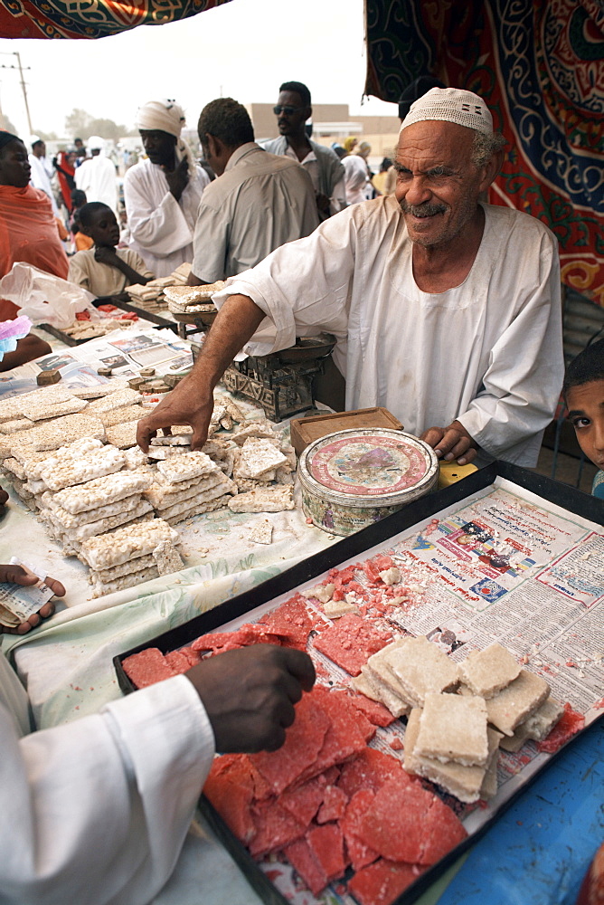 Sudanese sweets are sold at a festival celebrating the Prophet's birthday, Shendi, Sudan, Africa