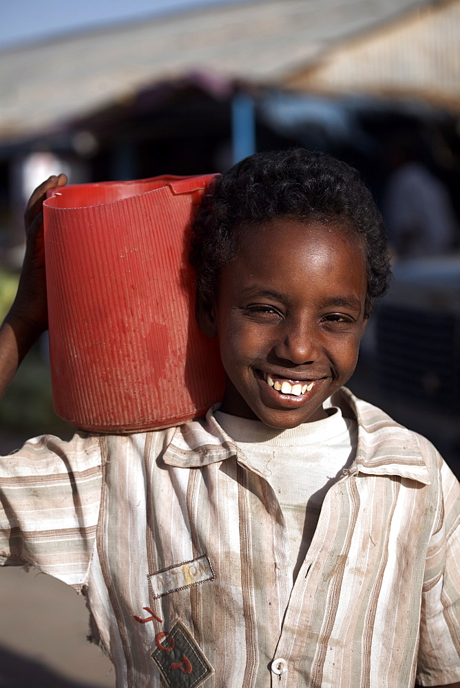 Sudanese boy carrying water, Atbara, Sudan, Africa