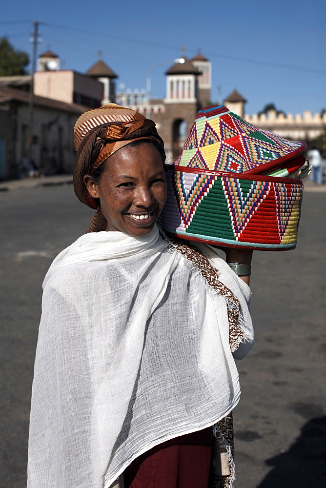 An Eritrean woman with traditional lunch box, Asmara, Eritrea, Africa