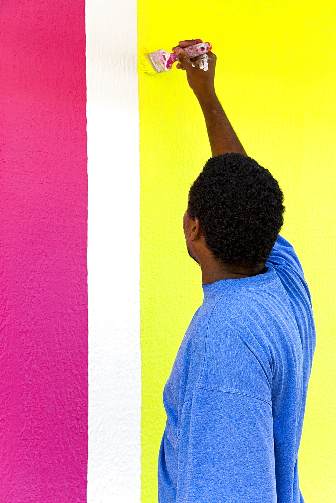 Painting a shop on Republique Street, Fort-de-France, Martinique, French Antilles, West Indies, Caribbean, Central America