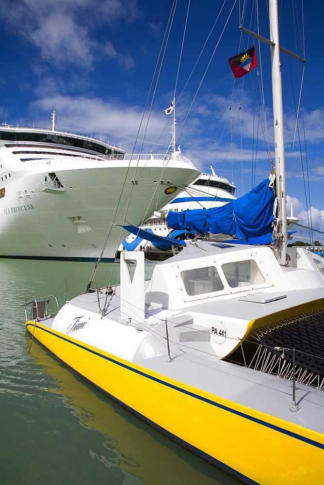 Catamaran and cruise ships, Heritage Quay, St. Johns, Antigua Island, Antigua and Barbuda, Leeward Islands, Lesser Antilles, West Indies, Caribbean, Central America