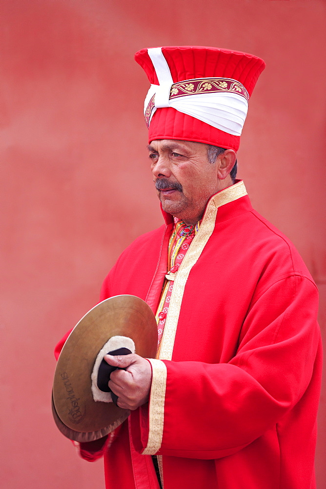 Traditional Turkish musician, Istanbul, Turkey, Europeboosted reds with curves, softened red shadows