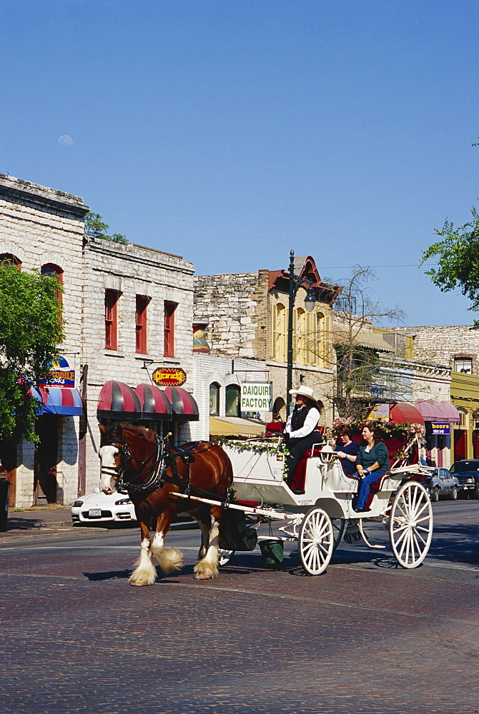 Horse and carriage on 6th Street, Austin, Texas, United States of America, North America