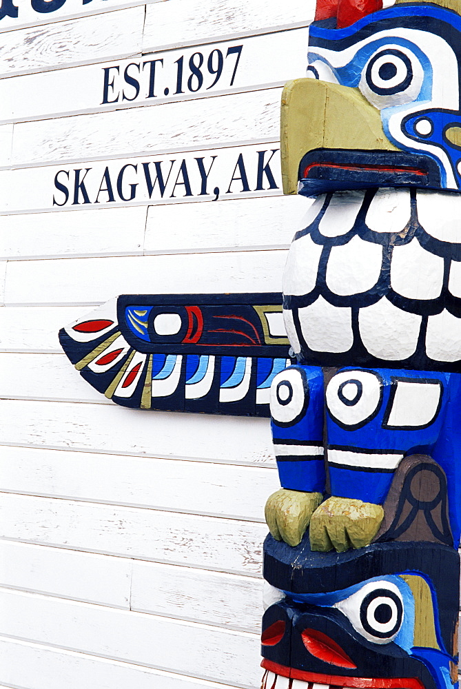 Totem pole outside store, Downtown, Skagway, Alaska, United States of America, North America