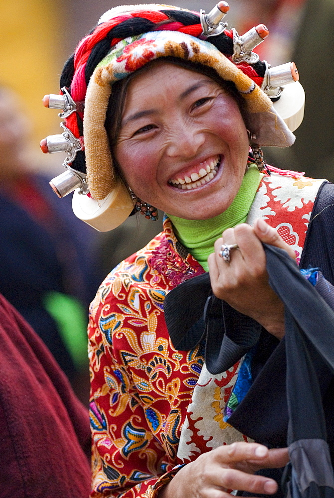 Young woman in ethnic dress, Jingang temple, Kangding, Sichuan, China, Asia