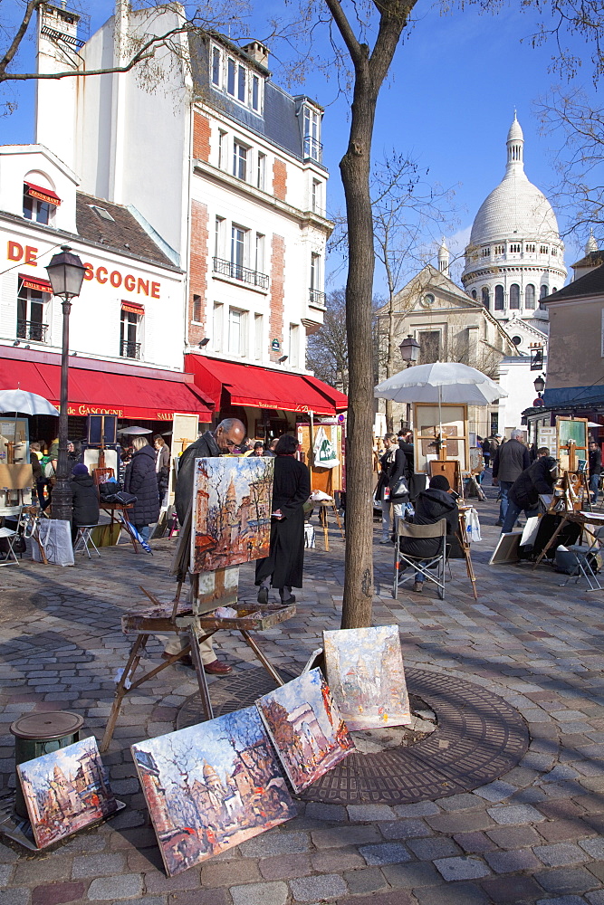 Paintings for sale in the Place du Tertre with Sacre Coeur Basilica in distance, Montmartre, Paris, France, Europe