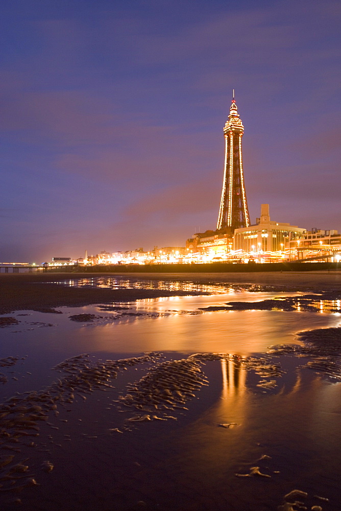 Blackpool Tower reflected on wet beach at dusk, Blackpool, Lancashire, England, United Kingdom, Europe