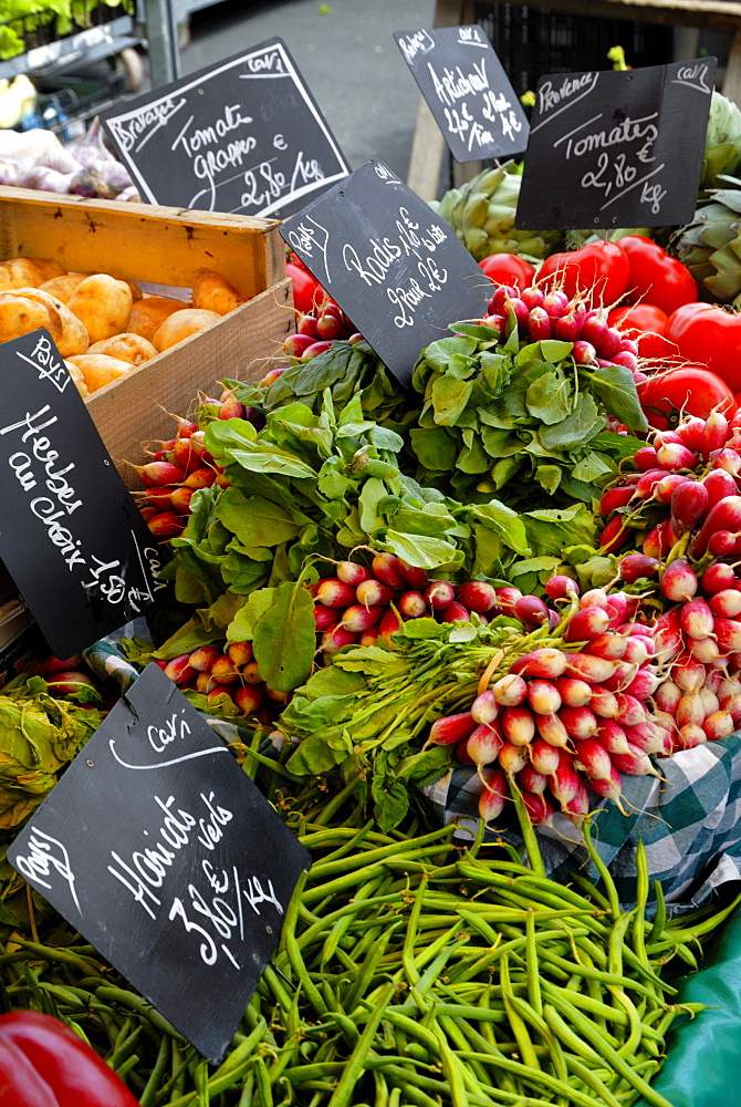 Salad and vegatables on a market stall, France, Europe