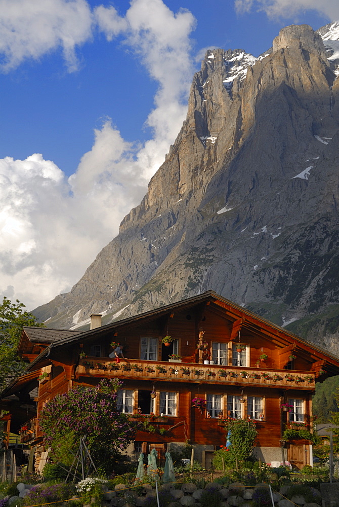 Chalet and mountains, Grindelwald, Bern, Switzerland, Europe