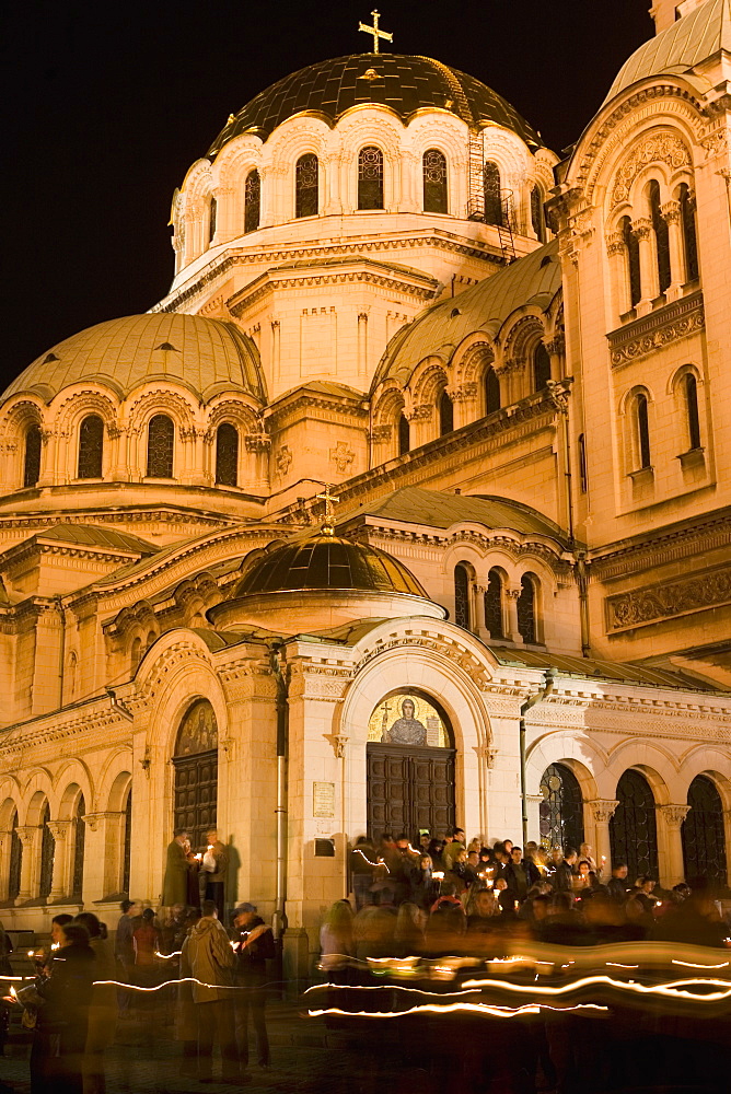 People with candles going round church during Easter celebrations, Aleksander Nevski church, Sofia, Bulgaria, Europe