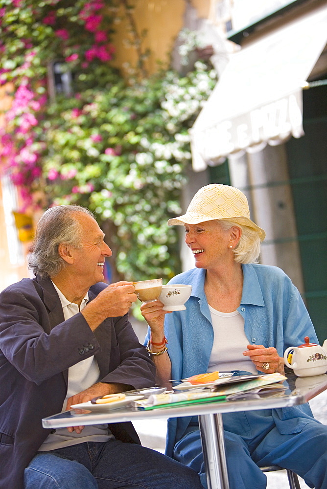 Senior tourists having breakfast in a local cafe, Rome, Lazio, Italy, Europe