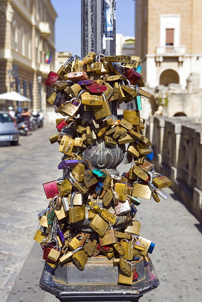 Love security locks, Sant'Oronzo square, Lecce, Lecce province, Puglia, Italy, Europe