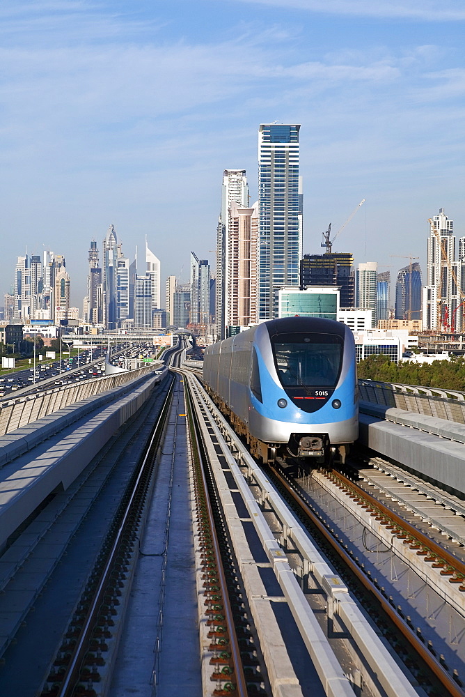 Skyline and Dubai Metro, Modern Elevated Metro system, opened in 2010, Dubai, United Arab Emirates, Middle East