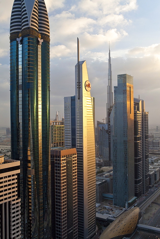 Elevated view over the modern skyscrapers along Sheikh Zayed Road looking towards the Burj Kalifa, Dubai, United Arab Emirates, Middle East