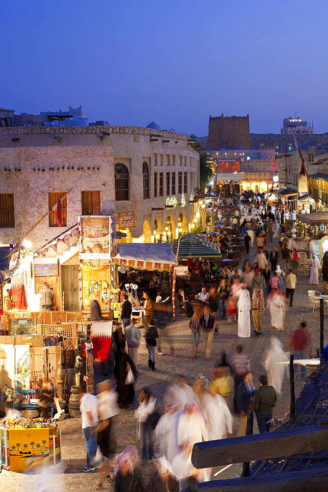 The restored Souq Waqif with mud rendered shops and exposed timber beams, Doha, Qatar, Middle East