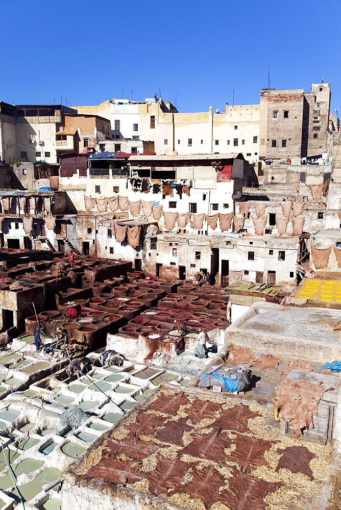 Chouwara traditional leather tannery in Old Fez, vats for tanning and dyeing leather hides and skins, Fez, Morocco, North Africa, Africa