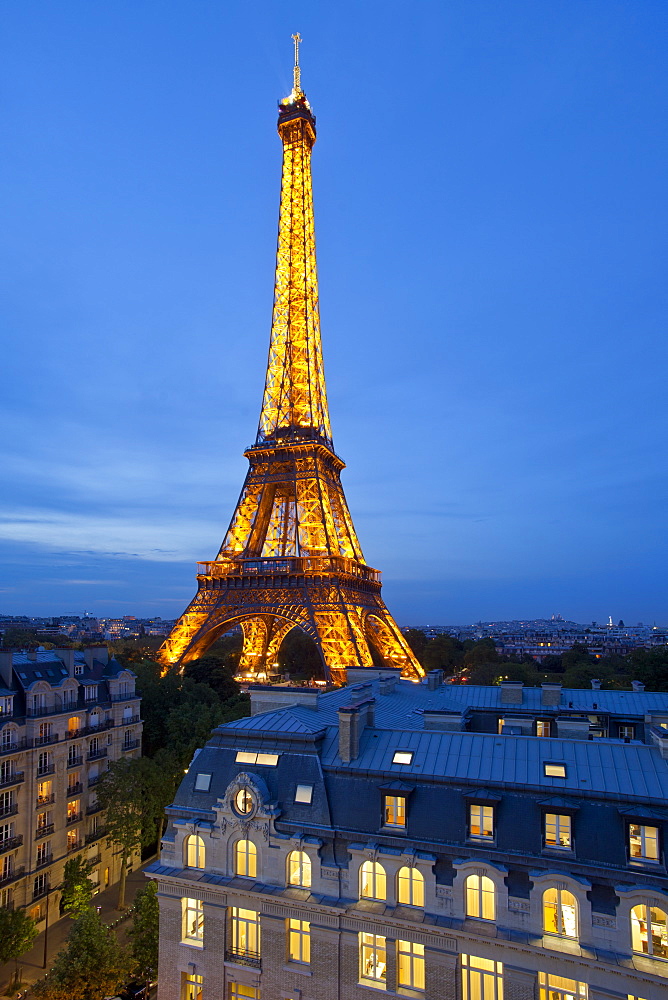 Eiffel Tower, viewed over rooftops, Paris, France, Europe