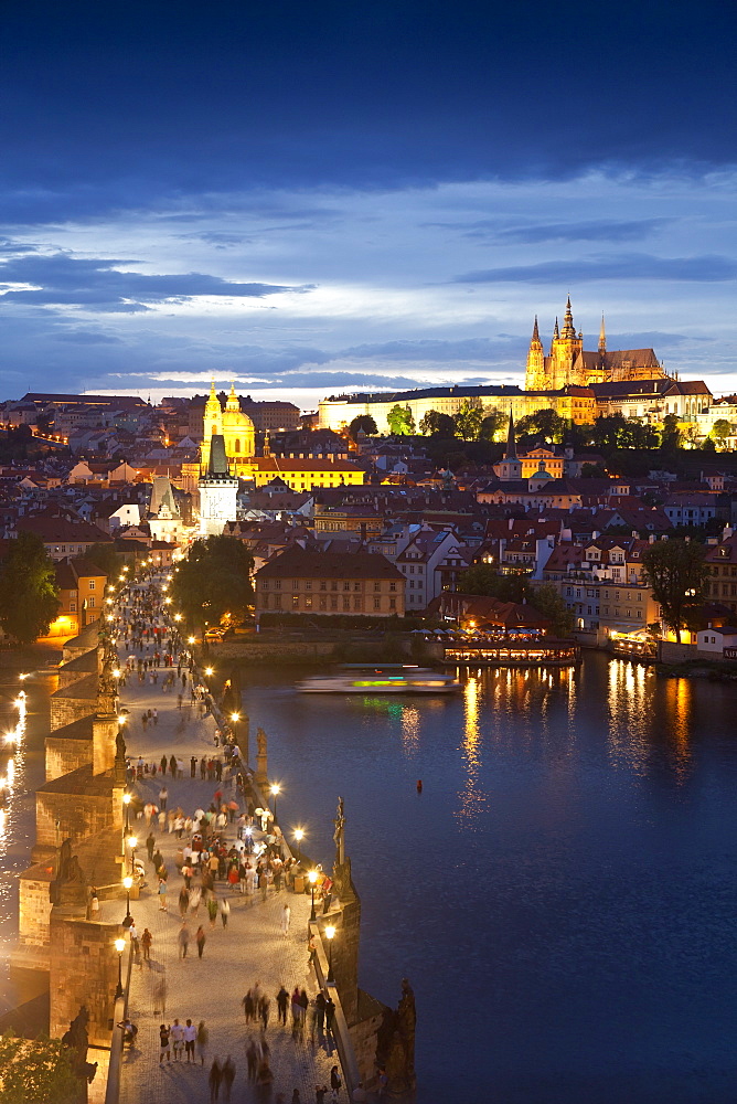 St. Vitus Cathedral, Charles Bridge, River Vltava and the Castle District illuminated at night, UNESCO World Heritage Site, Prague, Czech Republic, Europe