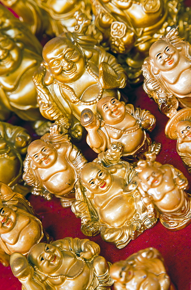 Mini Buddha figures for sale in a shop in Mumbai, India, Asia