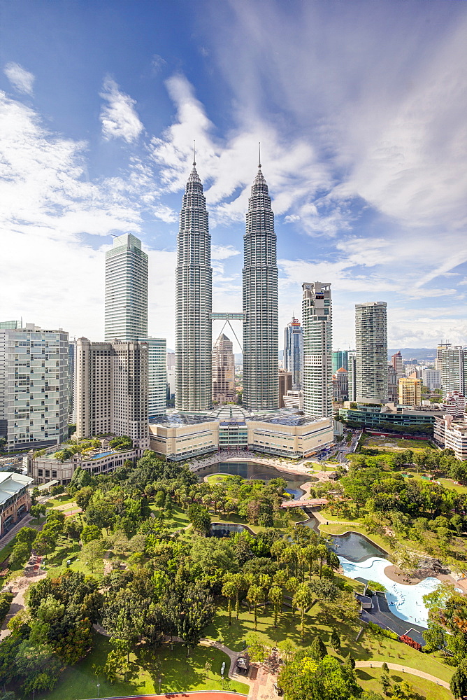 City centre including the KLCC park convention and shopping centre and the iconic 88 storey steel clad Petronas Towers, Kuala Lumpur, Malaysia, Southeast Asia, Asia