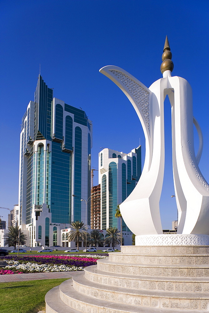 Twin Towers and teapot sculpture at eastern end of the Corniche, Ad Dawhah, Doha, Qatar, Middle East