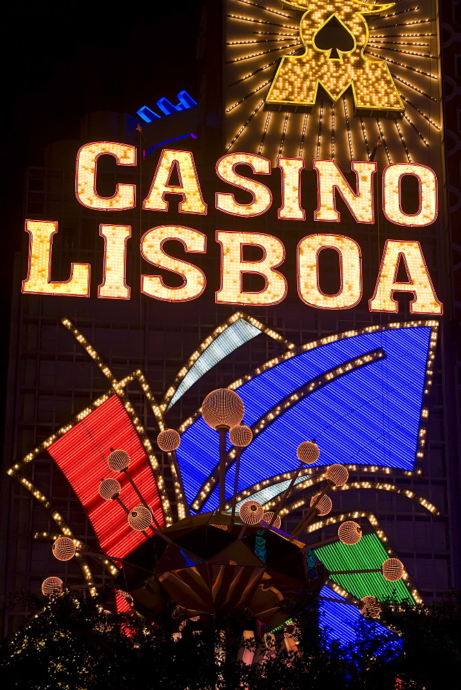 Lisboa Casino neon illuminated at night, Macau, China, Asia