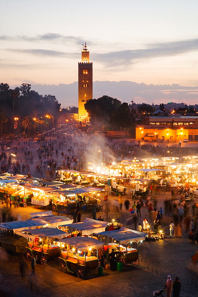 Elevated view of the Koutoubia Mosque at dusk from Djemaa el-Fna, Marrakech, Morocco, North Africa, Africa 