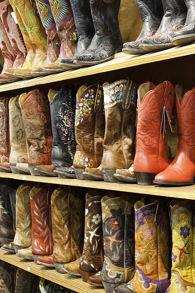 Cowboy boots lining the shelves, Austin, Texas, United States of America, North America