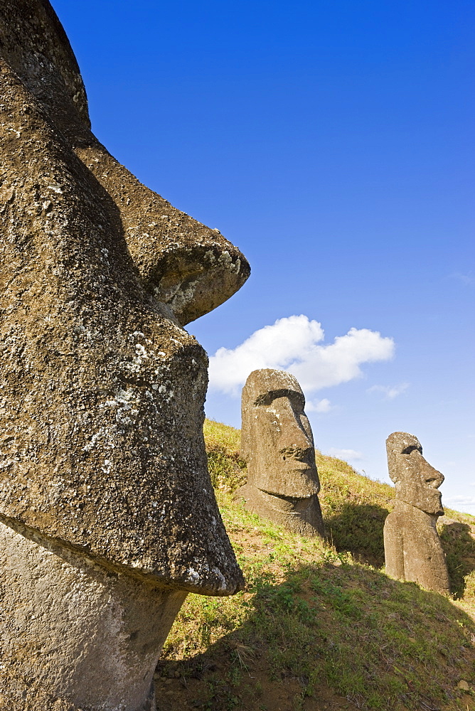 Giant monolithic stone Moai statues at Rano Raraku, Rapa Nui (Easter Island), UNESCO World Heritage Site, Chile, South America