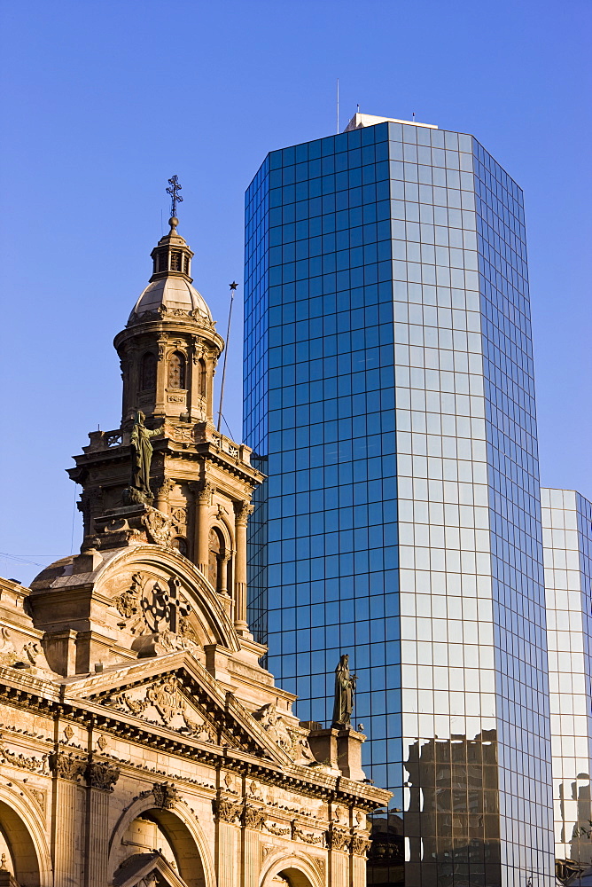 Cathedral Metropolitana and modern office building in Plaza de Armas, Santiago, Chile, South America