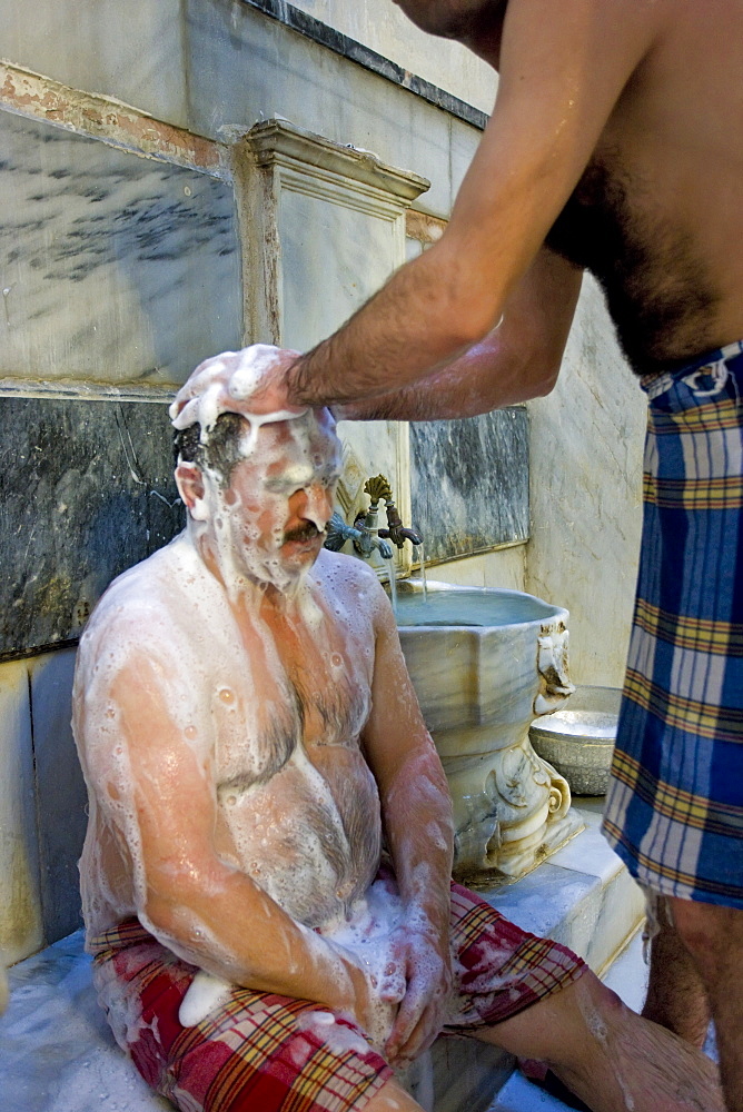 The classical Turkish Bath massage and wash inside the Gagaloglu Hamam, Istanbul, Turkey, Europe