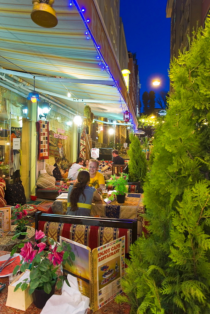 Restaurant dining outdoors in the trendy tourist district of Sultanahmet, Istanbul, Turkey, Europe