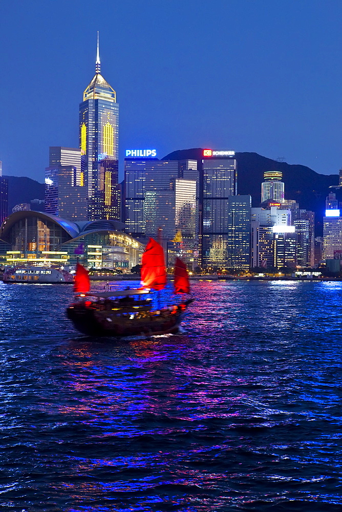 View from Kowloon of one of the last remaining Chinese sailing junks on Victoria Harbour, Hong Kong, China, Asia