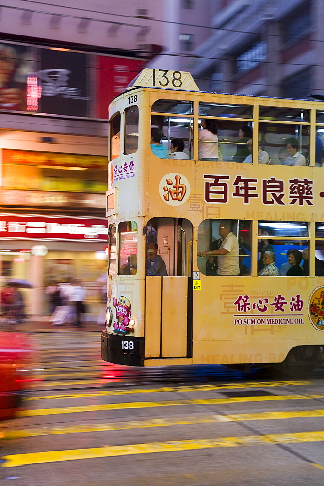 Brightly coloured trams running between Central and Wan Chai, Wan Chai, Hong Kong Island, Hong Kong, China, Asia