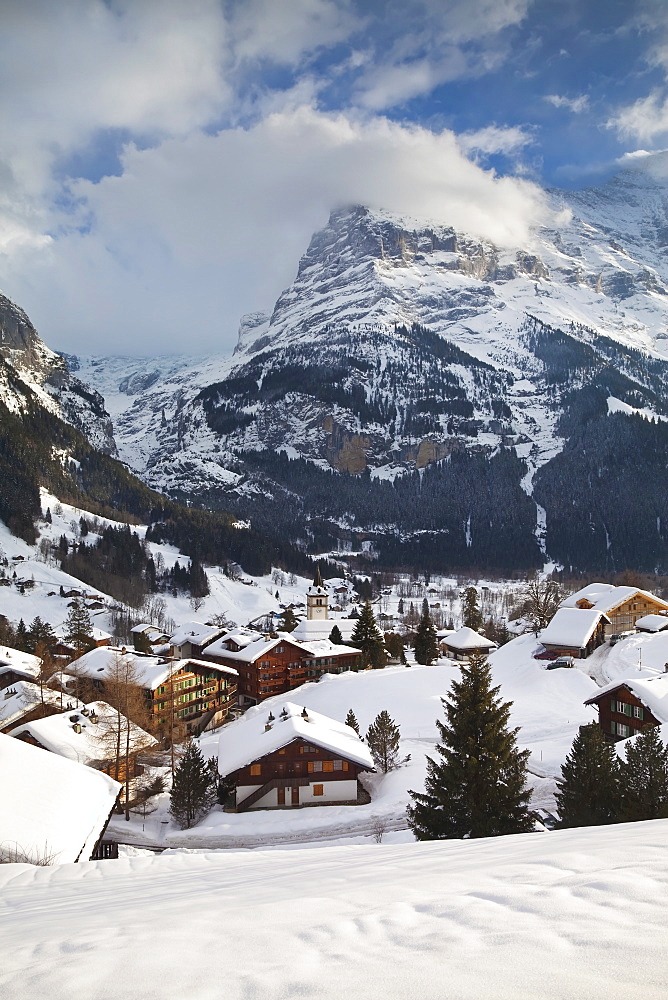 Grindelwald and the Wetterhorn mountain, Jungfrau region, Bernese Oberland, Swiss Alps, Switzerland, Europe