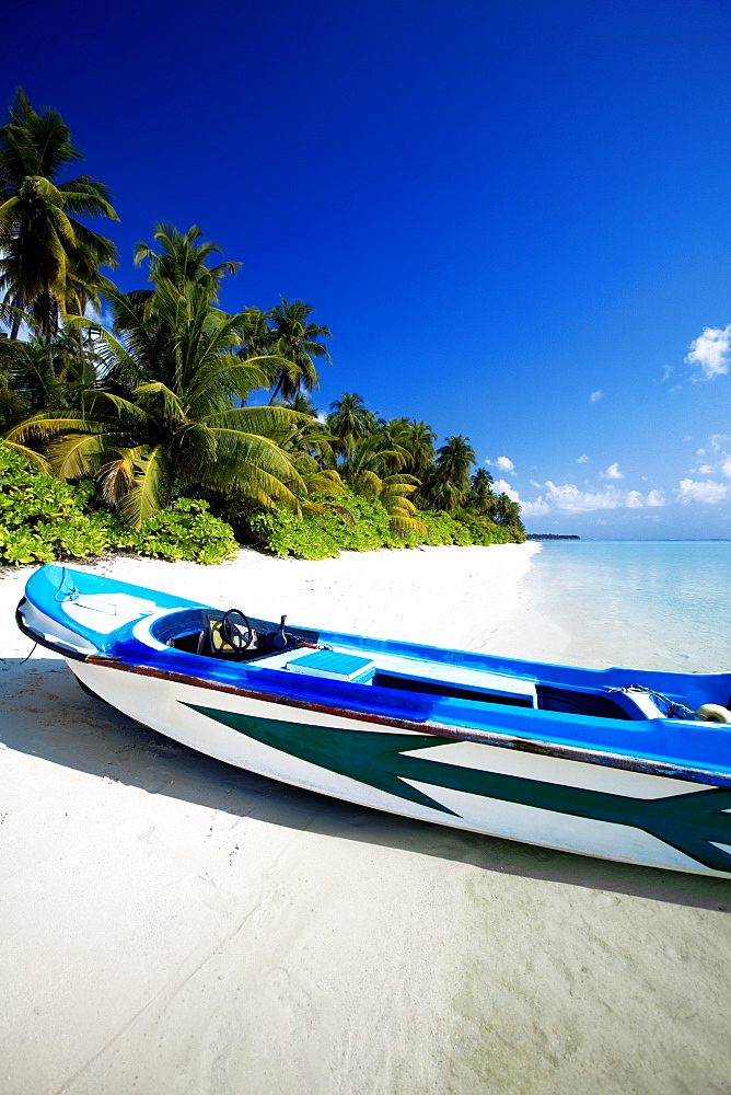 A small dinghy on a tropical beach, Maldives, Indian Ocean, Asia