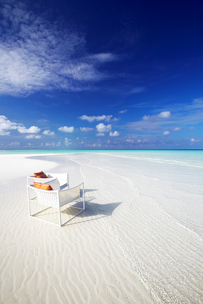 Deck chairs on tropical beach, Maldives, Indian Ocean, Asia