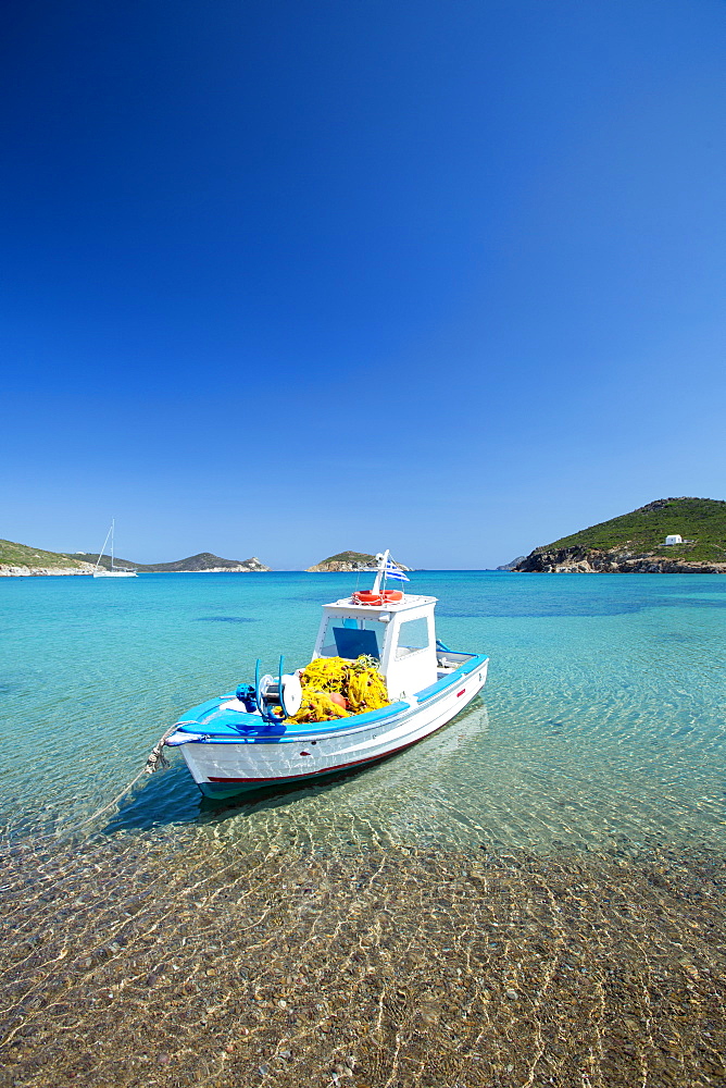 Fishing boat moored on the beach, Patmos Island, Dodecanese, Greek Islands, Greece, Europe