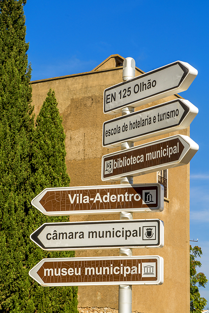 Signpost to attractions, old town, faro, algarve, portugal, europe.