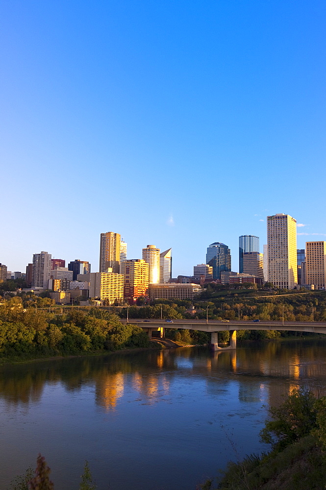 City at sunrise with the Saskatchewan River in foreground, Edmonton, Alberta, Canada, North America