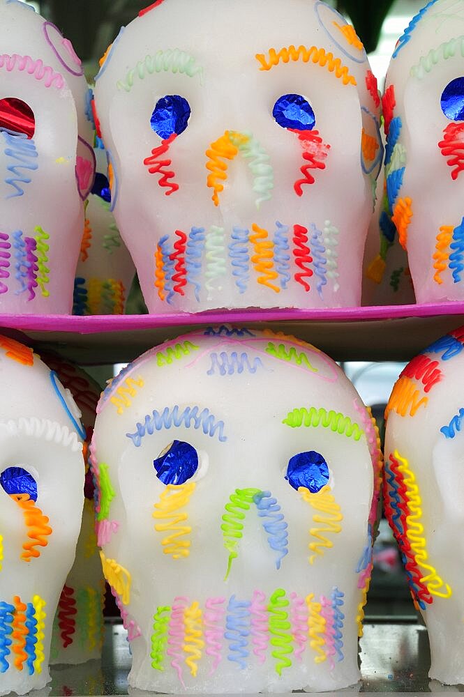 Mexico, Puebla, Sugar candies in the shape of skulls for Dia de los Muertos or Day of the Dead festivities.