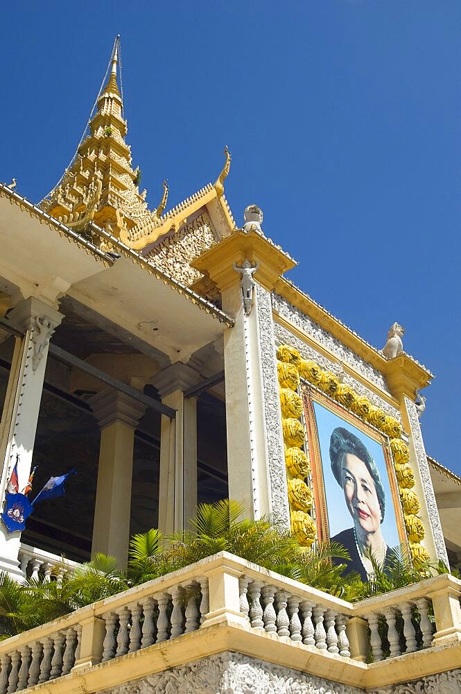 Cambodia, Phnom Penh, Queen Mother portrait at entrance to Royal palace.