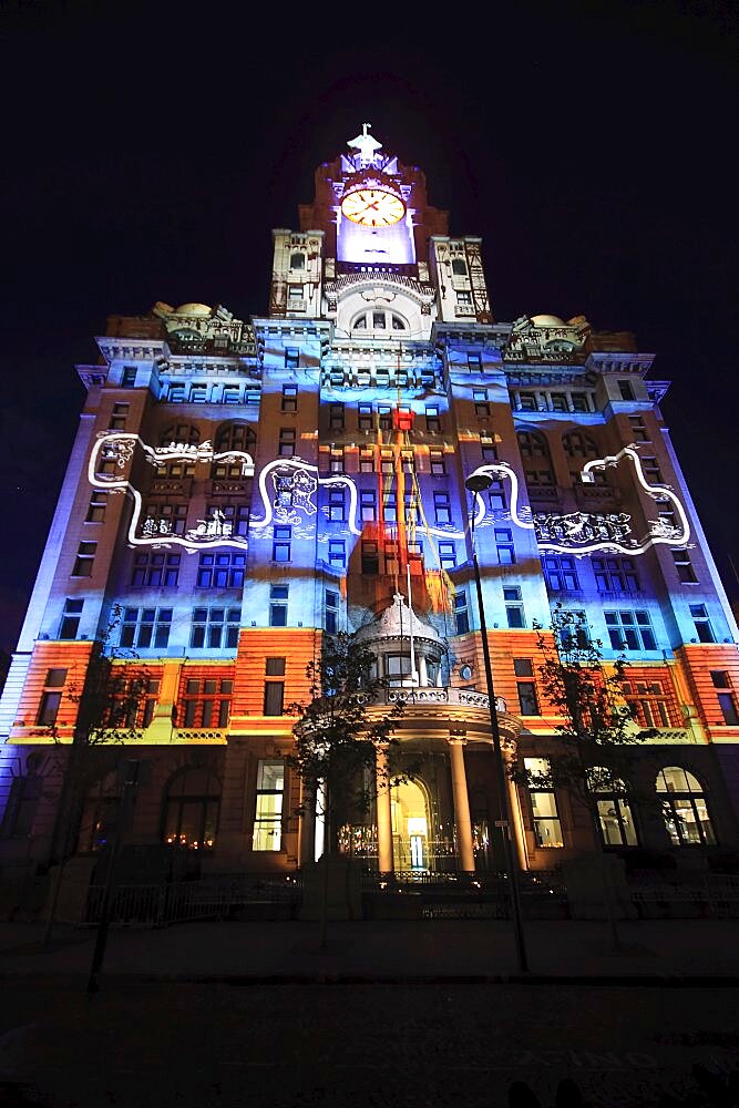 England, Merseyside, Liverpool, Royal Liver Building 100th anniversary constructed in 1911 celebrated by staging a 3D Macula light show with the theme of ship on the open seas.