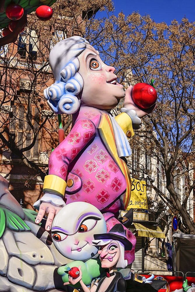 Spain, Valencia Province, Valencia, Papier Mache figure in the street during Las Fallas festival.