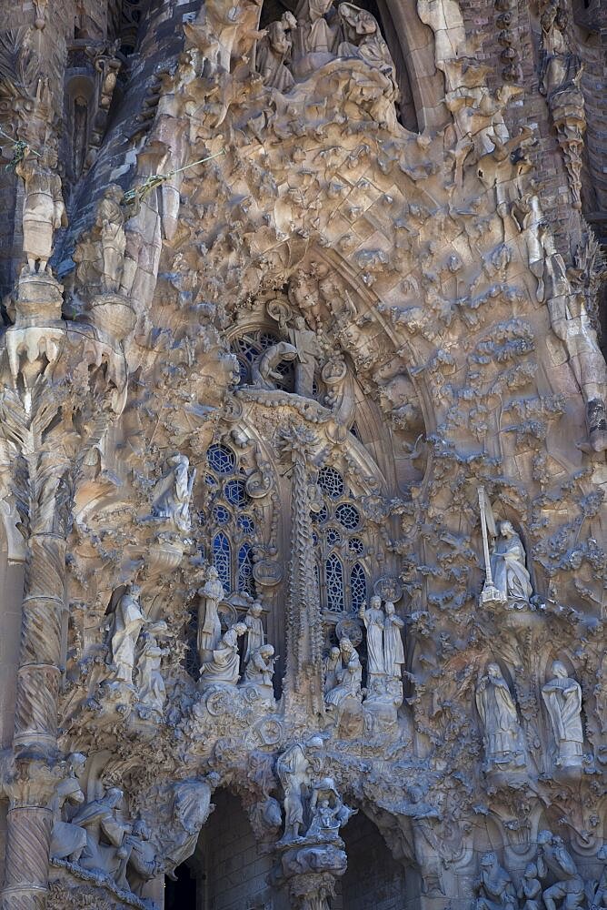 Spain, Catalonia, Barcelona, Eixample, exterior of La Sagrada Familia, designed by Antoni Gaudi.