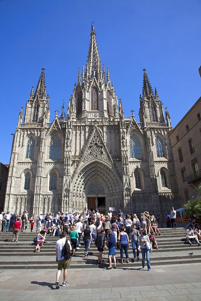 Spain, Catalonia, Barcelona, Tourists outside the Cathedral of the Holy Cross and Saint Eulalia.